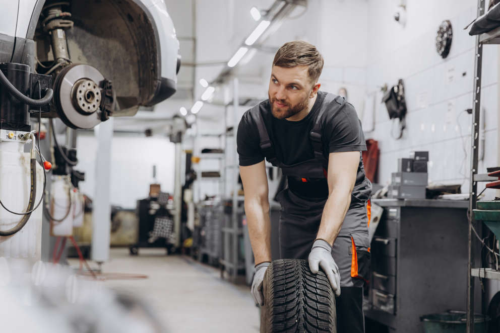 Happy Smiling Car Mechanic Working In Garage And C 2024 06 03 23 12 21 Utc