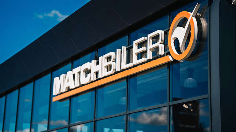 Matchbiler Logo På Facade 2026